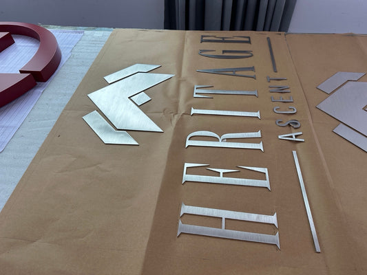 Custom Fabricated Stainless Steel Sign for Jess Garrett