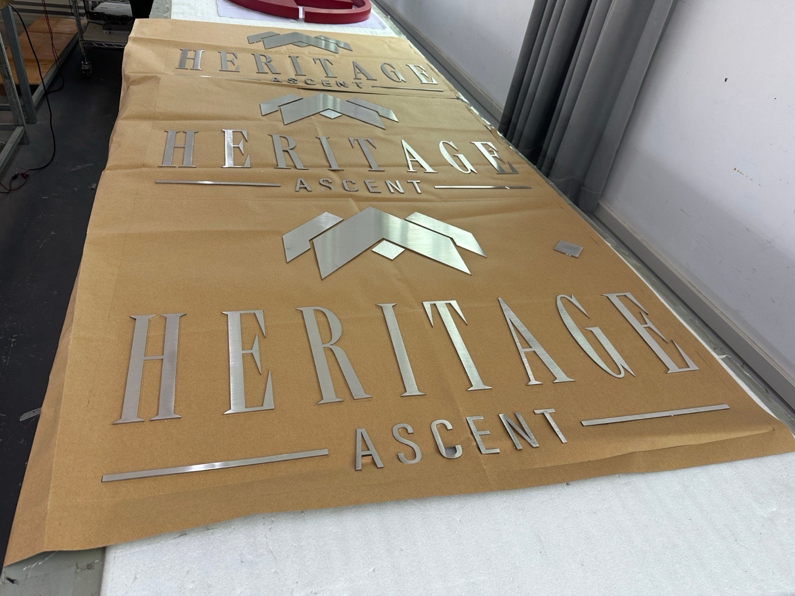 Custom Fabricated Stainless Steel Sign for Jess Garrett